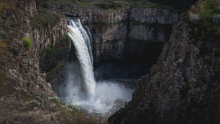 Waterfall side figure nature night - free mountains wallpaper