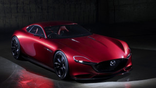 Red sports car dark room 51 - side and a person free wallpaper