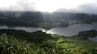 Lake green hills town cloudy - a view of a lake free wallpaper