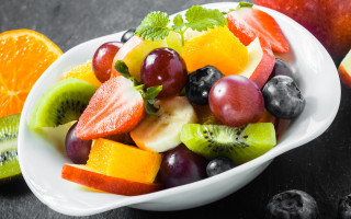 Fruit bowl orange kiwi space - the side of the bowl free wallpaper