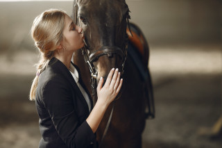 Woman kissing horse stable portrait - ancell stronach free wallpaper