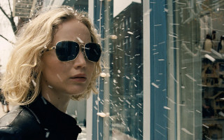Woman sunglasses snow cityscape building - a store window free wallpaper
