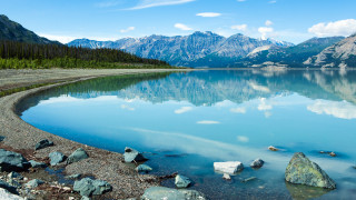 Lake mountains rocks sky clouds 2 - a few rock free wallpaper