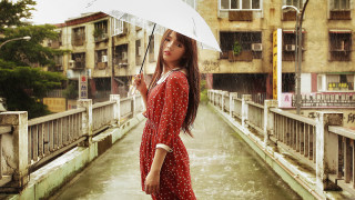 Woman red dress umbrella bridge 2 - an umbrella over her head free wallpaper