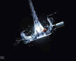 Floating bottle water splash red - a red cap free wallpaper