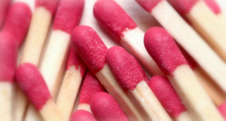 Matchsticks closeup tiltshift blurry background - tip free wallpaper