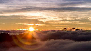 Sunset mountain clouds bird lens - a sunset over a mountain free wallpaper