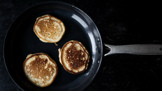 Three pancakes cooking stove spatula - a pan free wallpaper