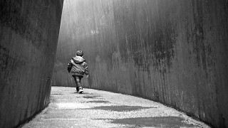 Person walking sidewalk wall sky - a sky background and a person free wallpaper