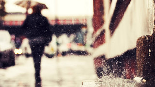 Woman umbrella rain city lights - a street holding free wallpaper