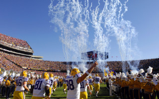 Football team uniforms fireworks field - eric peterson free wallpaper