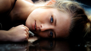 Young girl laying on ground - a young girl free wallpaper for desktop