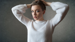 Woman white sweater holding hair - a white sweater free wallpaper for desktop