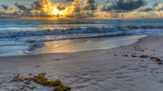 Beach waves sunset clouds ocean 3 - a sun free wallpaper