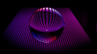 Purple holography raytracing fence honeycomb - a red light in the middle of it free wallpaper