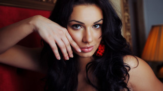 Woman longhair reddress posing blurry - free portrait wallpaper for desktop