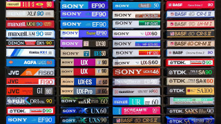 Television display remotes wall black - a wall in a room free wallpaper