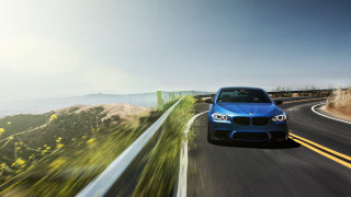 Blue car hillside fenced mountain - a blue car free wallpaper for desktop