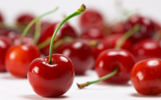 Cherry group white background blurry - a white surface free wallpaper