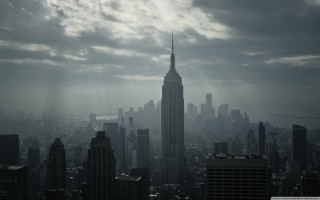 City skyline tall building clouds 2 - sun ray free wallpaper