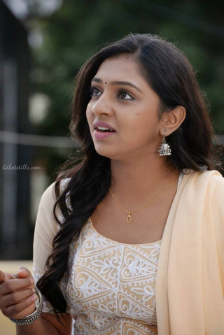 Woman white dress yellow jacket - serious free wallpaper for mobile