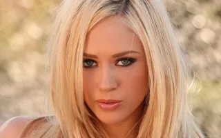 Blonde woman blue eyes tree 2 - promotional image free wallpaper
