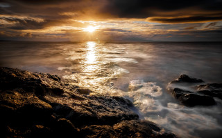 Sunset ocean rocky shore waves 4 - the rock free wallpaper