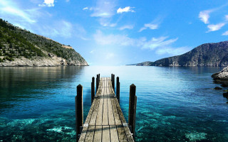Mountain dock water matte tranquil - a dock in the foreground free wallpaper