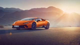 Bright orange sports car mountains 3 - orange sports car free wallpaper