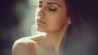 Woman longhair necklace looking down - long hair and a necklace free wallpaper