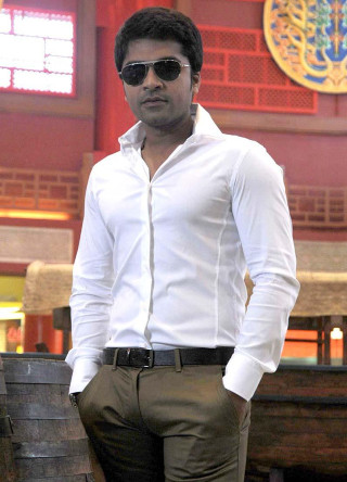 Man white shirt brown pants - a clock free wallpaper