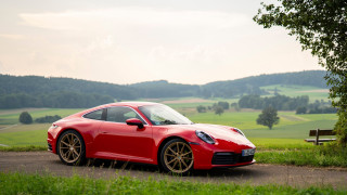 Red sports car road field 3 - a bench in the background free wallpaper