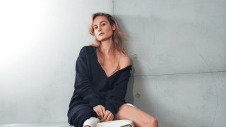 Woman sitting bench tilted head - christen dalsgaard free wallpaper