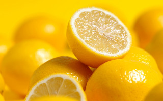 Lemons pile yellow surface cut - one cut free wallpaper
