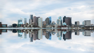 City skyline lake reflection cloudy - symmetric balance free wallpaper