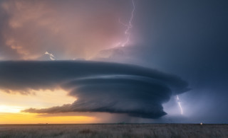Large cloud lightning field trees - a lightning bolt in the sky above free wallpaper