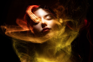 Woman blowing fire embers portrait - alberto seveso free wallpaper