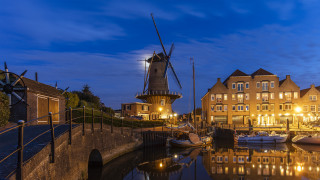 Windmill river boats night cityscape - a windmill free wallpaper for desktop