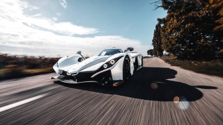 White sports car driving forest 2 - a white sports car free wallpaper for desktop