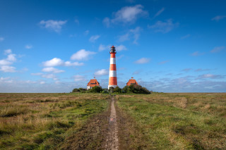 Dirt road lighthouse grassy field - a dirt road free wallpaper for desktop