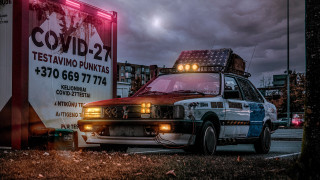 Policecar cyberpunk retrofuturism postapocalyptic cityscape - a police car free wallpaper