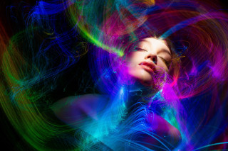 Woman closed eyes psychedelic hologram - the side with free wallpaper
