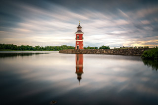 Red tower lake cloudy sky - artur tarnowski free wallpaper
