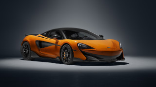 Orange sports car dark room 19 - free cars wallpaper