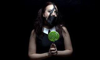 Woman gasmask lollipop transgressive portrait - studio portrait free wallpaper