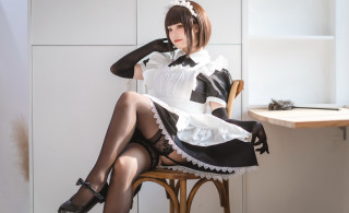 Maid outfit crossed legs brown - a chair in the background free wallpaper