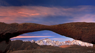 Rock arch mountain sunset sky - an abstract sculpture free wallpaper for desktop