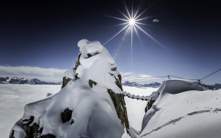 Snow mountain rope bridge sun - a mountain free wallpaper