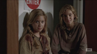 Young women standing room enter - the wall behind them free wallpaper