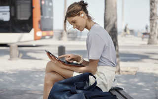 Woman bench tablet earbuds bus - product photo free wallpaper for desktop